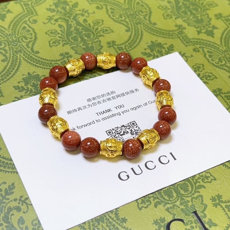 G*u*i bracelets